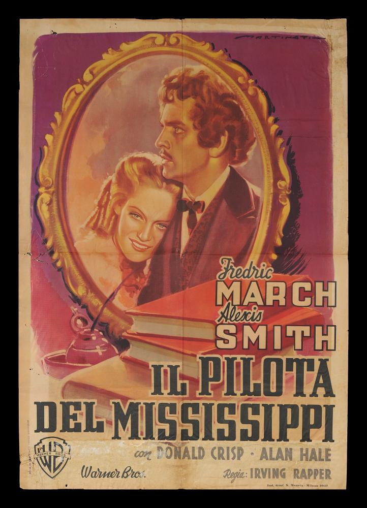 L'immagine riproduce uno dei manifesti conservati presso la Mediateca Regionale Pugliese (vedi Note). Si tratta di uno dei manifesti del film “Il pilota del Mississipi” del 1944 per la regia di Irving Rapper. La firma che si legge in alto a destra è dell’illustratore Luigi Martinati, toscano di nascita, da considerarsi uno degli interpreti della prima maniera del manifesto di cinema. Possiamo osservare alcuni degli elementi che contraddistinguono lo stile del pittore come i giochi di contrasto con colori netti, i dettagli sui grandi volti realizzati con tinte dalle gamme dorate, i volti ricchi di espressione ed intensità, una malinconia velata nello sguardo. Nello specifico colpisce la scelta di inserire i ritratti dei due protagonisti in una cornice che può essere uno ...