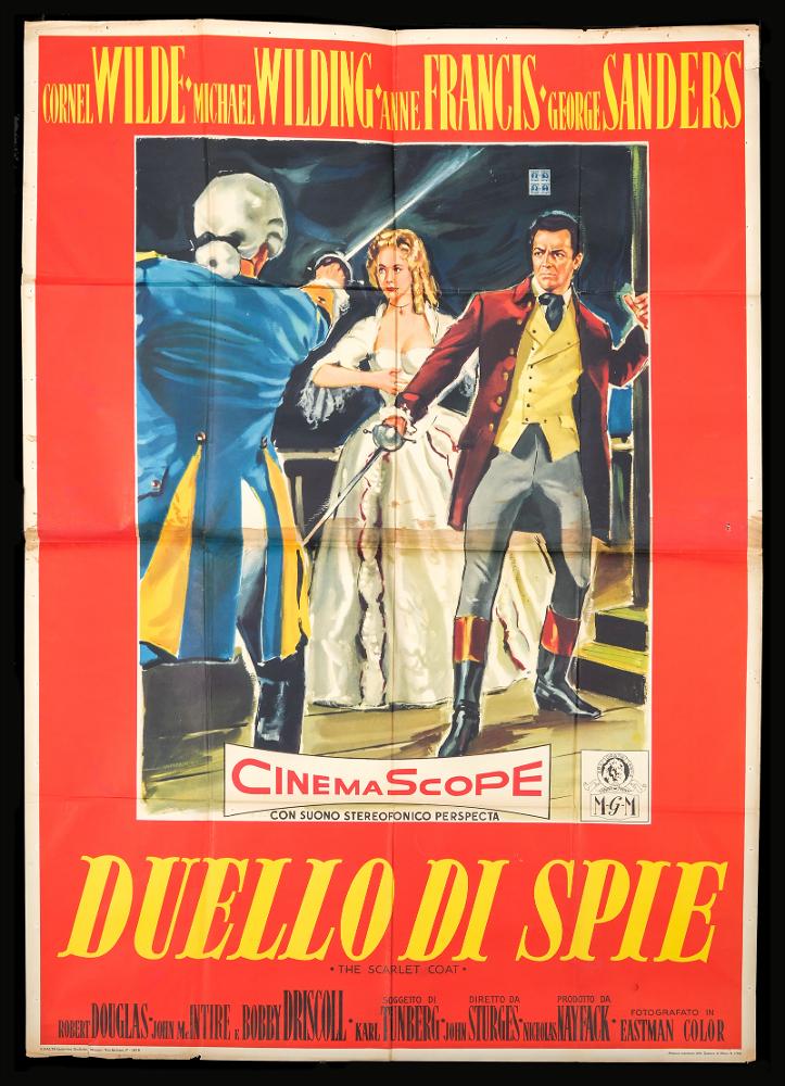 L'immagine riproduce uno dei manifesti conservati presso la Mediateca Regionale Pugliese (vedi Note). Si tratta della versione grafica per il manifesto del film americano "Duello di spie". Senza firma, la composizione mostra una pittura tradizionale realistica e pulita, una narrazione chiara che si esprime nella scena unica centrale in cui sono evidenti i richiami alla trama storica. Tutto è ornato da una larga cornice rossa, su cui risalta il titolo che assume anche carattere decorativo....
