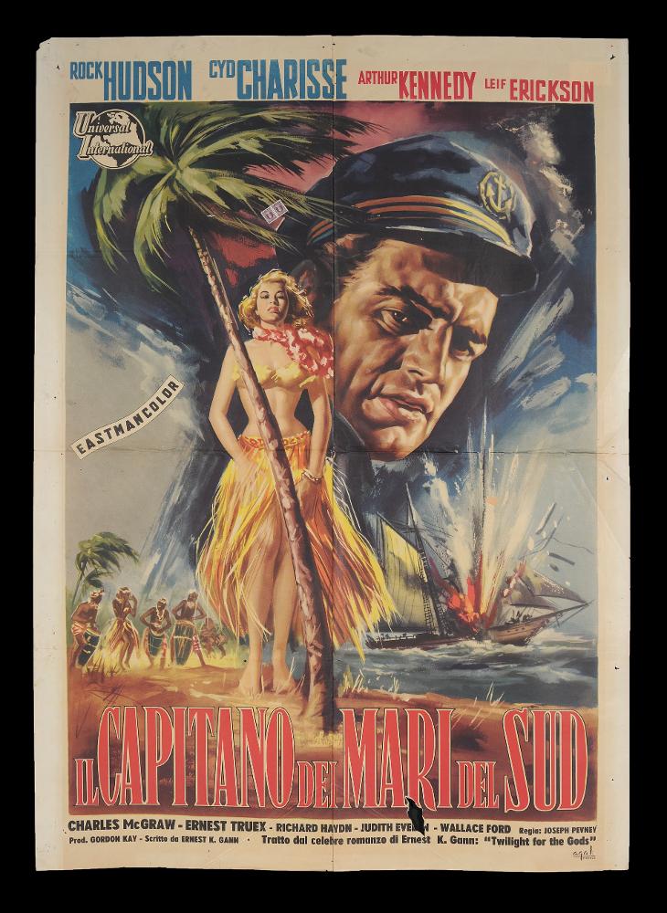 L'immagine riproduce uno dei manifesti conservati presso la Mediateca Regionale Pugliese (vedi Note). Si tratta della versione grafica per il manifesto del film americano "Il Capitano dei mari del Sud" del 1958. Anche se senza firma, la composizione presenta una pittura figurativa maestosa, degna dei più noti artisti di cinema. Bellissimo e realistico il ritratto dell'attore Rock Hudson (?), mentre intorno si scatena una tempesta, una nave affonda e una tribù suona le percussioni, tutti elementi che immergono lo spettatore in un'ambientazione esotica. In primo piano, a figura intera, l'attrice Cyd Charisse è ritratta come una perfetta "femme fatale", interpretando i canoni di bellezza di quegli anni....