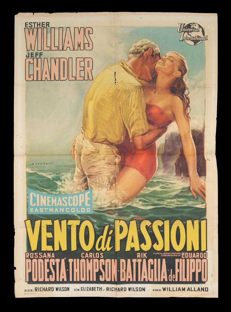 L'immagine riproduce uno dei manifesti conservati presso la Mediateca Regionale Pugliese (vedi Note). Si tratta di una delle versioni grafiche del manifesto del film "Vento di passioni", la cui illustrazione è a firma di Alfredo Capitani. Pittore di cinema del primo periodo, Capitani fondò uno studio nel 1919 per la realizzazione di manifesti pubblicitari e poi con Luigi Martinati una società per il lancio di pellicole cinematografiche. Il suo stile richiama quello di Ballester, con un uso di colori luminosi e sfumati con effetti di mirabile enfasi pittorica. Le sue rappresentazioni sono sempre originali, grazie all'uso di colori pieni arricchiti dalle loro variazioni tonali cangianti: si notino qui ad esempio, sui due protagonisti, le bellissime sfumature calde e brill...