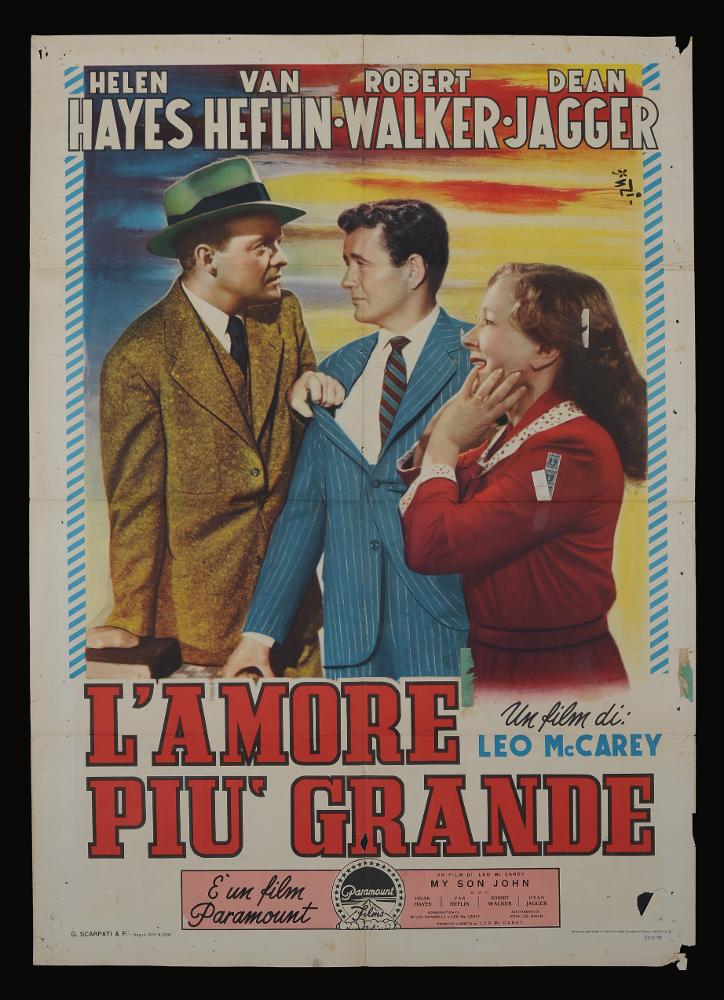 L'immagine riproduce uno dei manifesti conservati presso la Mediateca Regionale Pugliese (vedi Note). Si tratta di una delle versioni del manifesto del film americano "L'amore più grande", a firma di Francesco Fiorenzi. Nella bella composizione si ritrovano tutte le caratteristiche stilistiche dell'artista: l'unione di colori caleidoscopici, diversi tra loro, il racconto del film attraverso foto di scena che riprendono un significativo momento narrativo. Autodidatta trasferitosi a Roma nel periodo più florido per il cinema italiano, fu il primo, tra i pittori di cinema dell'epoca, ad anticipare il linguaggio grafico e fotografico attraverso la realizzazione di collage con ritratti e scene prese dal film e l'inserimento di elementi pittorici per unire le immagini sparse ...