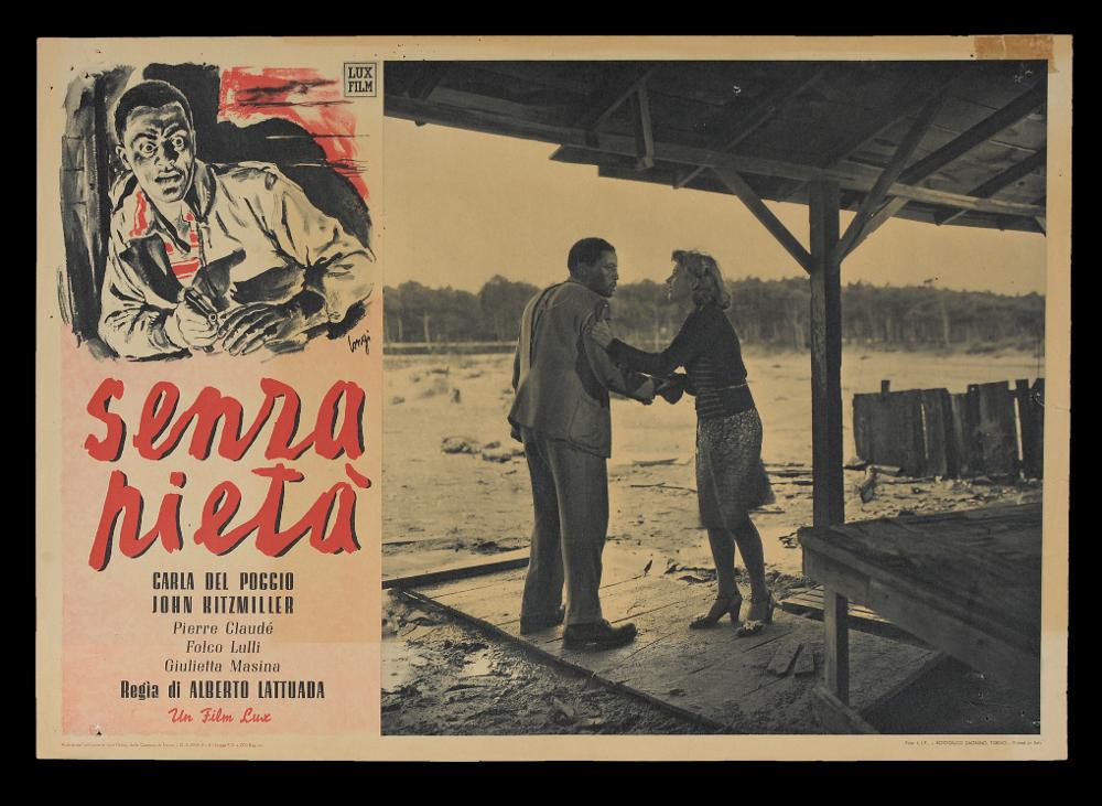 L'immagine riproduce uno dei manifesti conservati presso la Mediateca Regionale Pugliese (vedi Note). Si tratta di uno dei soggetti per la fotobusta del film italiano "Senza pietà", la cui illustrazione è a firma di Longi. Il forte realismo dei volti è una caratteristica del pittore, che iniziò la carriera artistica come ritrattista per poi dedicarsi all'attività di illustratore e cartellonista cinematografico per circa 20 anni, firmando molte opere per i più noti film dell'epoca, fino alla sua morte, avvenuta prematuramente all'età di 59 anni. L'illustrazione, resa con pochi colori e tratti veloci che rendono la drammaticità di un momento in cui vi è l'intenso sguardo del protagonista John Kitzmiller, accompagna la fotografia di scena tratta dal film, come di consueto ...