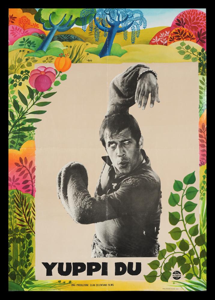 L'immagine riproduce uno dei manifesti conservati presso la Mediateca Regionale Pugliese (vedi Note). Si tratta di una delle versioni grafiche del manifesto del film "Yuppi du" del 1975 per la regia di Adriano Celentano, nelle vesti anche di protagonista principale. Il manifesto si presenta in una veste grafica molto contemporanea e pop composta da una cornice vegetale dai colori molto accesi e brillanti e dagli elementi tondeggianti che abbracciano il mezzo busto di Adriano Celentano, in contrasto in bianco e nero, immortalato in una delle sue movenze che sin da subito l’hanno reso riconoscibile ed unico. Quasi a confondersi con i fiori è presente la firma dell’illustratore, probabilmente Zanini o Anini, ma non è possibile una attribuzione certa....