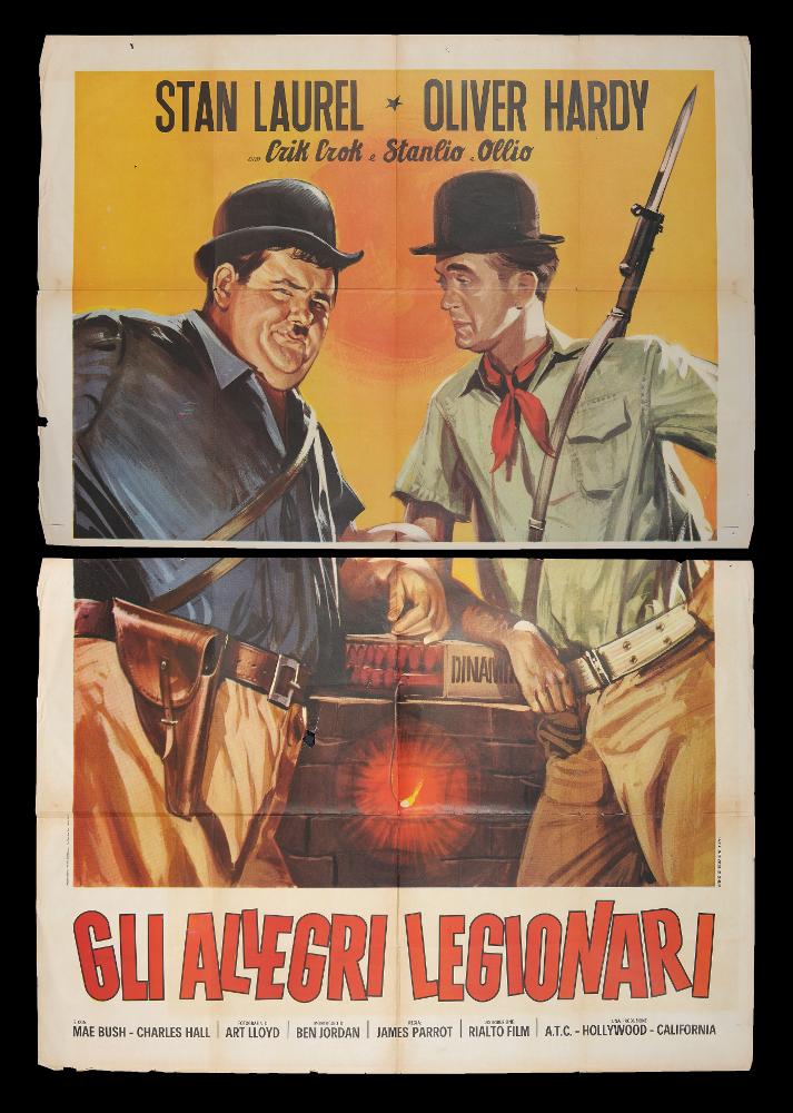 L'immagine riproduce uno dei manifesti conservati presso la Mediateca Regionale Pugliese (vedi Note). Si tratta della locandina del film "Gli allegri legionari", edizione del 1970. È una delle moltissime composizioni grafiche realizzate per la comicità di Stanlio & Ollio, il duo iconico tra i più amati della storia del cinema. Rispetto alle altre, qui i due protagonisti sono ripresi pittoricamente nella loro naturalezza, cosa che mette lo stesso in risalto lo stile unico e caratterizzante dei due attori, fondato su una comicità elementare che sfrutta la mimica facciale e il linguaggio del corpo per gag semplici ed esilaranti, adatte a ogni tipo di pubblico....