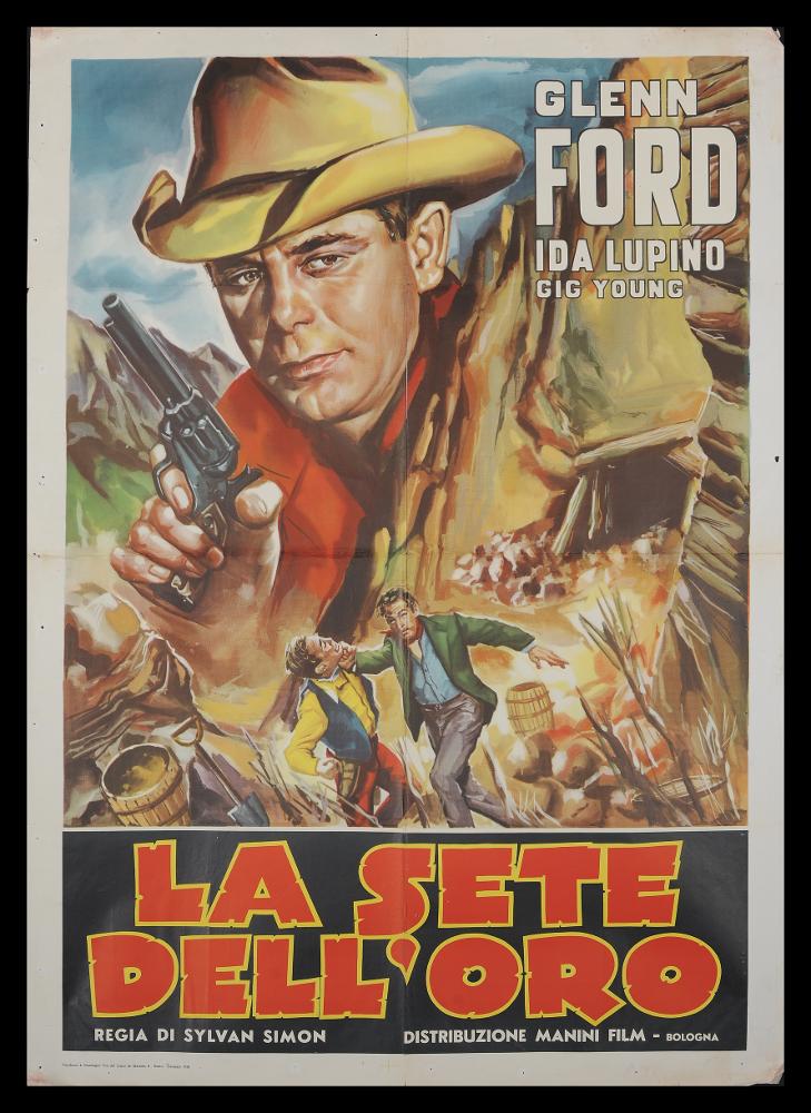 L'immagine riproduce uno dei manifesti conservati presso la Mediateca Regionale Pugliese (vedi Note). Si tratta di una delle versioni del manifesto del film western americano degli anni '40 "La sete dell'oro". Senza firma, il manifesto mostra una composizione pittorica piuttosto classica e figurativa con una suddivisione grafica precisa degli spazi. In alto domina il grande ritratto dell'attore Glenn Ford, che con la piccola scena di combattimento al centro descrivono pienamente l'ambientazione western. In basso, su fondo nero il grande titolo del film, con un lettering pieno e colori dominanti, dal forte impatto scenico e comunicativo....