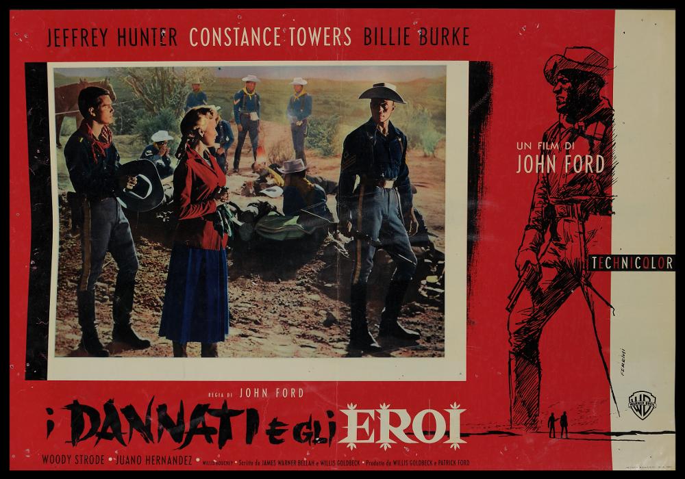 L'immagine riproduce uno dei manifesti conservati presso la Mediateca Regionale Pugliese (vedi Note). Si tratta di uno dei soggetti della fotobusta del film western “I dannati e gli eroi”, a firma di Ferrini (Renato Ferrini). Artista fiorentino, Ferrini si avvicina all'ambiente cinematografico negli anni '30 in una Roma in pieno fermento; mostra un grande amore per l'illustrazione con tratti rapidi e intensi resa con una tecnica che ricorda l'uso della grafite, come si può notare in altri suoi lavori. La composizione grafica sulla destra mostra a figura intera il sergente accusato ingiustamente di duplice omicidio: il suo sguardo duro sembra rivolto verso la scena principale, rappresentata dalla fotografia di scena a colori che occupa gran parte dello spazio del soggett...