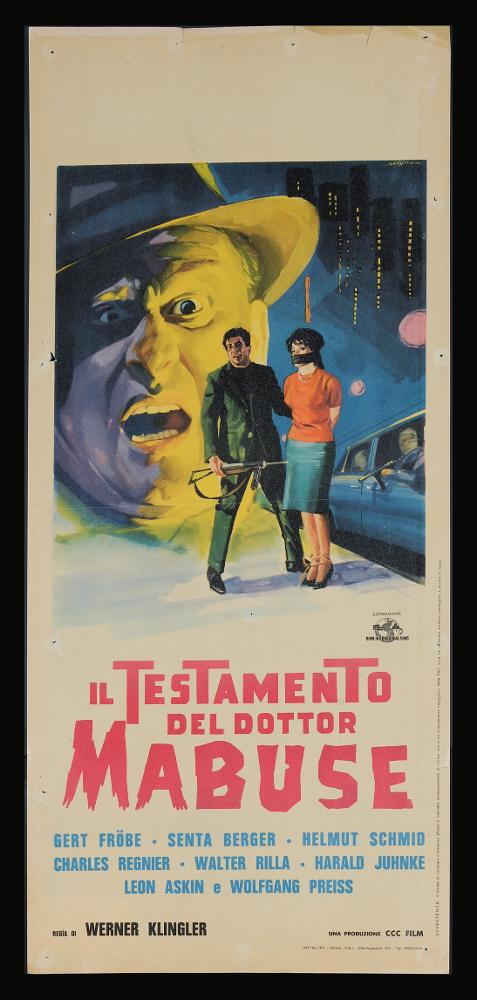 L'immagine riproduce uno dei manifesti conservati presso la Mediateca Regionale Pugliese (vedi Note). Si tratta di una delle versioni grafiche per la locandina del film “Il testamento del dottor Mabuse” del 1962 per la regia di Werner Klingler. La firma che leggiamo in alto a destra è di Serafini, illustratore molto attivo tra gli anni Sessanta e gli anni Settanta.La composizione si presenta molto luminosa grazie al grande volto sullo sfondo che per un lato ha tutta la luce puntata quasi ci fosse una fonte diretta sulla destra. Lo sfondo invece è caratterizzato da un blu notte su una città del quale si intravedono i contorni dei palazzi, illuminati dall'interno. In primo piano due dei protagonisti del film in una delle scene principali, da notare come Serafini abbia uno...