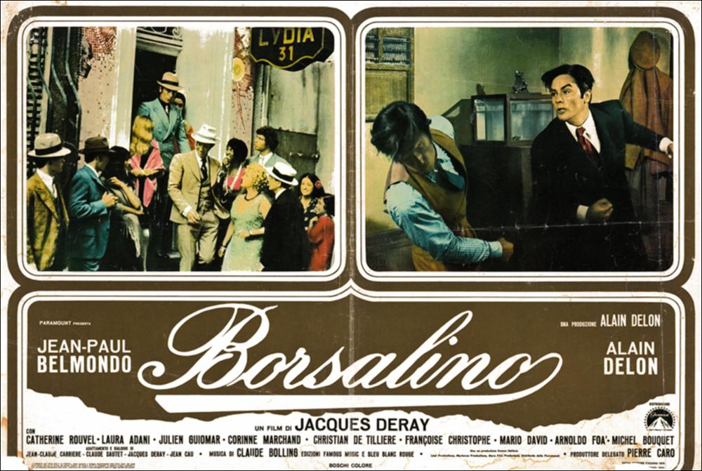 L'immagine digitale in oggetto è scansione della fotobusta originale del film "Borsalino", elaborata in occasione della mostra "Riccardo Cucciolla - Ritratto d'Attore" organizzata nel 2012 dall'Associazione culturale “Attraverso lo Spettacolo”, dall'Assessorato al Mediterraneo, Cultura e Turismo della Regione Puglia e dal Servizio Biblioteca e Comunicazione Istituzionale del Consiglio Regionale della Puglia. L'opera, dai toni caldi e raffinati, è divisa in tre riquadri: due superiori che includono scene tratte dal film e una inferiore che mette insieme il titolo e i nomi degli attori. Il film, diretto da Jacques Deray e prodotto da Alain Delon, esce nelle sale italiane nel 1970. Tratta dal romanzo francese “Bandits à Marseille” di Eugène Saccomanno, la pellicola, ambien...