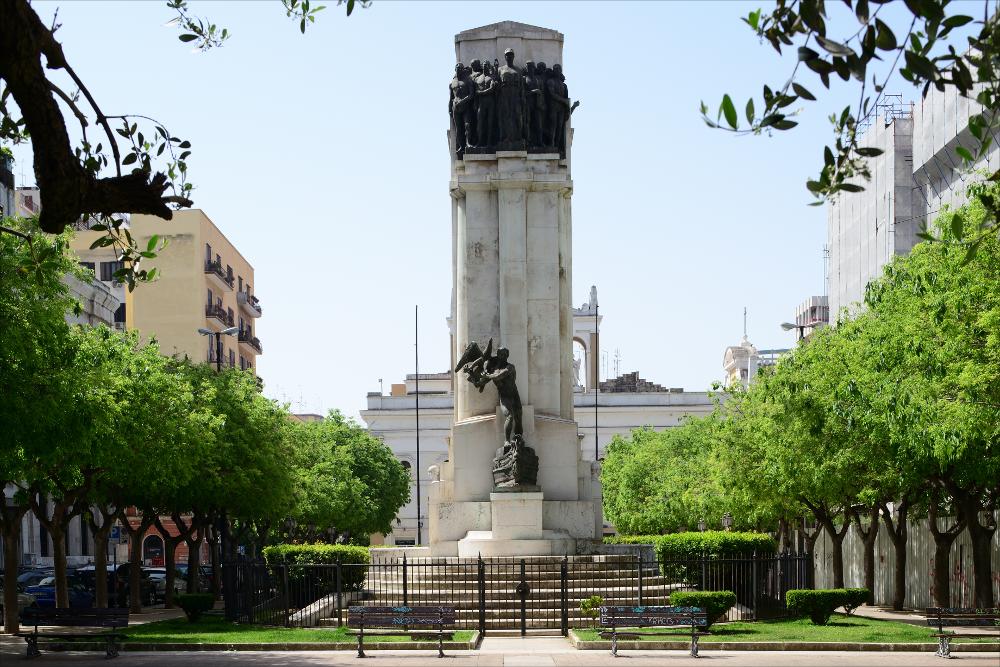 L'immagine digitale raffigura uno dei lati dell'imponente Monumento ai Caduti di Taranto. Inaugurato nel novembre del 1930 alla presenza del re Vittorio Emanuele III, è il più grande monumento del Borgo Nuovo collocato al centro di Piazza della Vittoria, a pochi passi dal corso principale cittadino. Ideato e disegnato dallo scultore originario di Taranto Francesco Paolo Como, è di tipo "a cippo", realizzato in pietra calcarea di Trani con quattro gruppi di statue in bronzo. Nella parte superiore, da un lato un gruppo di soldati è accompagnato da Atena, dea della guerra (in foto), dall'altro da Vittoria, la dea della vittoria in battaglia; in quella inferiore, un gruppo, denominato Aquilifero, rappresenta un soldato nell'atto di scagliare in volo un'aquila (in foto), sul...