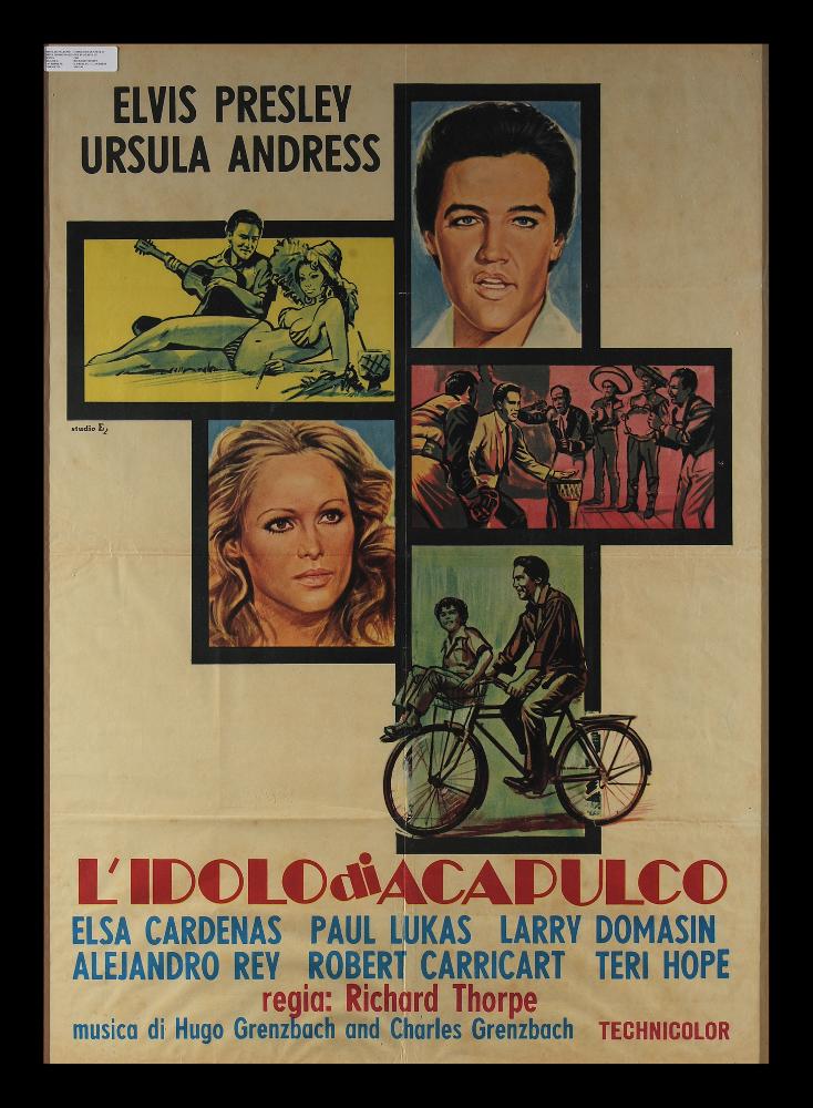 Il manifesto è firmato dallo Studio E2, fondato da Ezio Tarantelli e Enzo Sciotti. È stata scelta una composizione grafica che mette in evidenza i due protagonisti: Elvis Presley e Ursula Andress ritratti a colori e tre riquadri che propongono scene della pellicola con un filtro colore.  L'idolo di Acapulco (titolo originale: Fun in Acapulco) è un film del 1963 diretto da Richard Thorpe ed interpretato da Elvis Presley e Ursula Andress. Il manifesto originale è conservato nell’Archivio della Mediateca Regionale Pugliese....