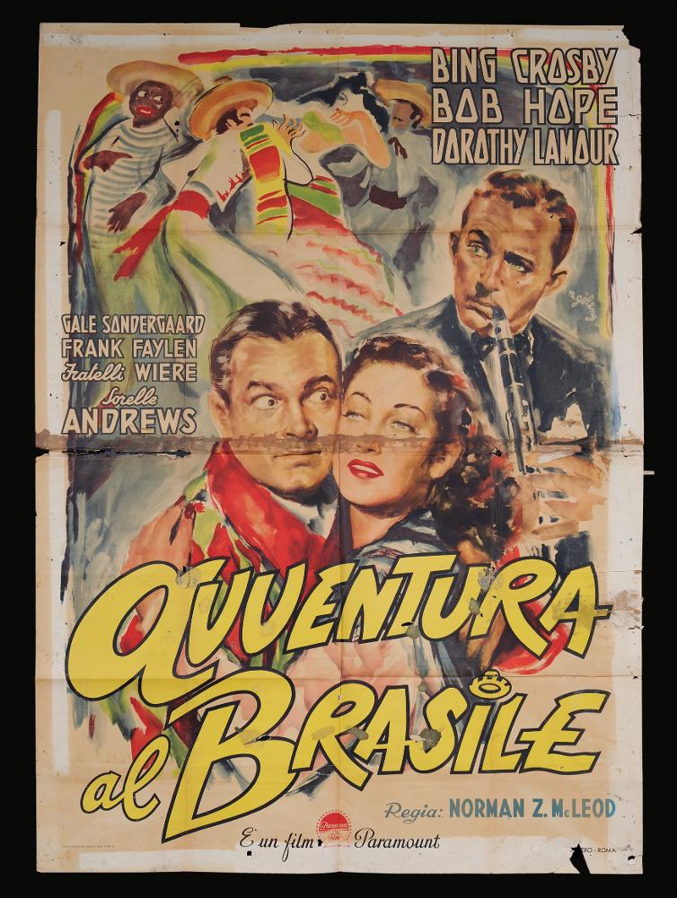 L'immagine riproduce uno dei manifesti conservati presso la Mediateca Regionale Pugliese (vedi Note). Si tratta di una delle versioni grafiche per il manifesto del film "Avventura in Brasile" del 1947 per la regia di Norman Z. McLeod. La firma che leggiamo sul lato a destra appartiene a Rinaldo Gèleng (R. Gèleng), illustratore romano, artista poliedrico ed eclettico. Classe 1920, dopo gli studi d'arte, visse e lavorò per molti anni a Parigi, poi a Milano dove realizzò una serie di copertine per Mondadori e infine a Roma, dove realizzò alcuni manifesti per i film di Fellini. Il suo stile fresco e pittorico è fatto di pennellate liquide e sfumate, con spunti grafici originali, composizioni personali, in cui rivela la sua dote di ritrattista. Gèleng anche in quest’opera ma...