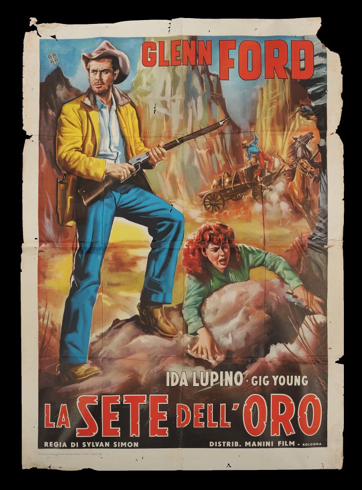 L'immagine riproduce uno dei manifesti conservati presso la Mediateca Regionale Pugliese (vedi Note). Si tratta di una delle versioni del manifesto del film western americano degli anni '40 "La sete dell'oro". Senza firma, il manifesto mostra una composizione pittorica piuttosto classica e figurativa con un'unica grande scena narrativa, probabilmente opera della stessa mano dell'altro manifesto dedicato al film, in collezione. Imponente è la descrizione paesaggistica che immerge il fruitore tra le rocce dell'America del vecchio West. In primo piano, Glenn Ford è rappresentato a figura intera insieme ad Ida Lupino, in un momento drammatico, enfatizzato dalla piccola scena di una sparatoria in secondo piano....