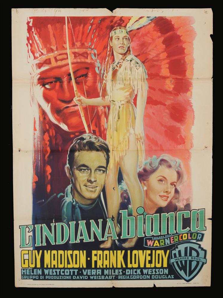 L'immagine riproduce uno dei manifesti conservati presso la Mediateca Regionale Pugliese (vedi Note). Si tratta di una delle versioni grafiche per il manifesto del film "L’indiana bianca" del 1953 per la regia di Gordon Douglas. La composizione non presenta firma ma si inserisce nello stile dei cartelloni cinematografici degli anni Cinquanta. Al centro, a delimitare idealmente il centro del manifesto, una delle protagoniste femminili che rappresenta la bellezza del lontano e affascinante mondo degli indiani, accentuato dallo sfondo rosso che vede, tono su tono, il grande ritratto di un uomo, probabilmente uno dei capi del villaggio. In primo piano emergono alla base i due volti di altri due protagonisti, dagli abiti occidentali. Nella parte inferiore ritroviamo il titol...