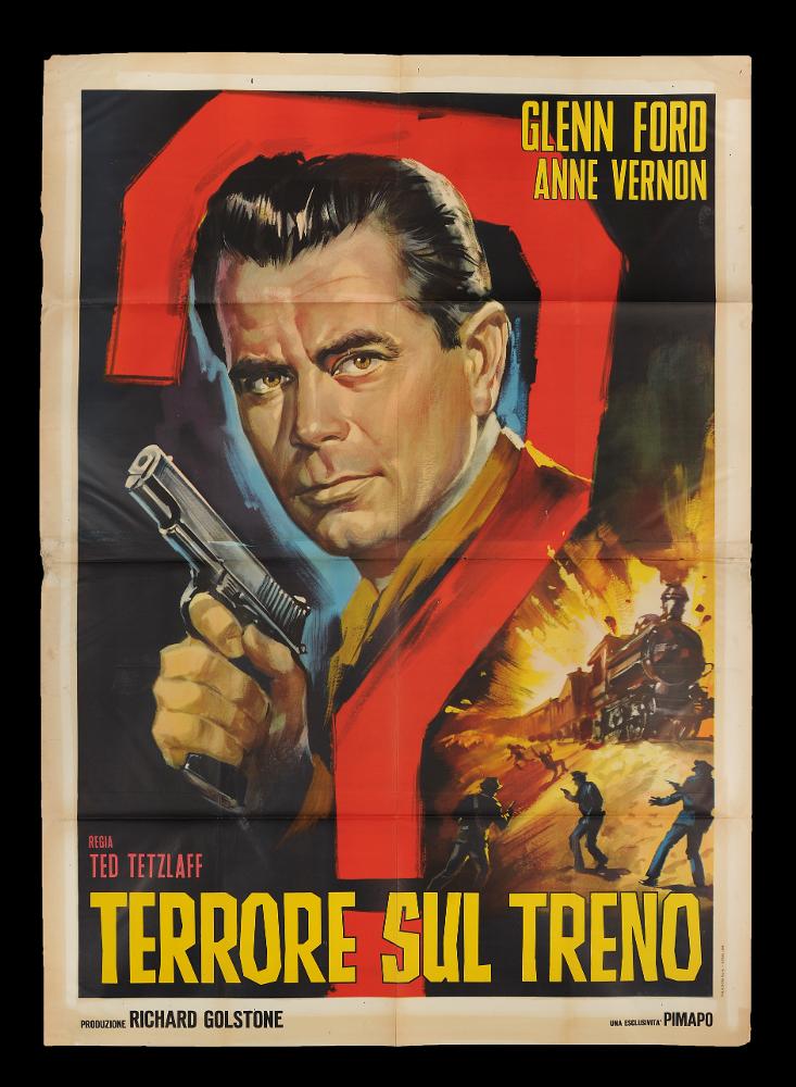 L'immagine riproduce uno dei manifesti conservati presso la Mediateca Regionale Pugliese (vedi Note). Si tratta di una delle versioni grafiche del manifesto del thriller americano "Terrore sul treno". Anche se priva di firma, la composizione è notevole e risente ancora pienamente dei canoni stilistici della pittura di cinema degli anni '50. Il linguaggio è realistico come si nota dal grande ritratto fedele dell'attore Glenn Ford, che emerge dal fondo grazie al contrasto con le pennellate chiare dietro il volto. Nello spazio, vi sono anche effetti scenografici come la piccola scena del treno in esplosione sulla destra, che anticipa delle scene cruciali del film e il grande punto interrogativo intorno alla figura di Ford che enfatizza maggiormente il genere thriller. Degn...
