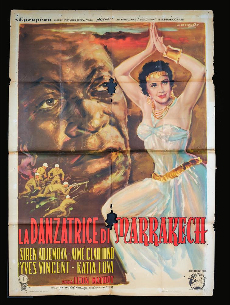 L'immagine riproduce uno dei manifesti conservati presso la Mediateca Regionale Pugliese (vedi Note). Si tratta di uno dei manifesti del film “La danzatrice di Marrakech” del 1950 per la regia di Léon Mathot. La composizione grafica è a firma di Angelo Cesselon, illustratore veneziano considerato tra i più originali ‘pittori di cinema’. Dal manifesto si coglie la straordinaria abilità tecnico-pittorica di Cesselon che crea un grande ritratto dai tratti intensi,  inoltre sembra confondersi, sullo sfondo, con il paesaggio grazie alle pennellate sfumate. In primo piano la bellissima danzatrice illumina tutta la scena....