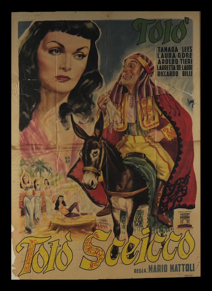 Il grande manifesto è a firma di Longi (Carlantonio Longi) con un grande ritratto di Totò a cavallo di un asino e sullo sfondo il ritratto del volto Tamara Lees. Longi è un artista, disegnatore e grafico, che ha sperimentato diversi stili: dal tradizionale sfumato, policromo e narrativo degli anni Trenta, fino alle sintesi grafiche contemporanee fatte di pochi colori e disegni lineari. Le prime opere di Longi presentano uno stile più tradizionale caratterizzato dal linguaggio semplice e dai bei ritratti. Il manifesto originale è conservato nell’Archivio della Mediateca Regionale Pugliese....