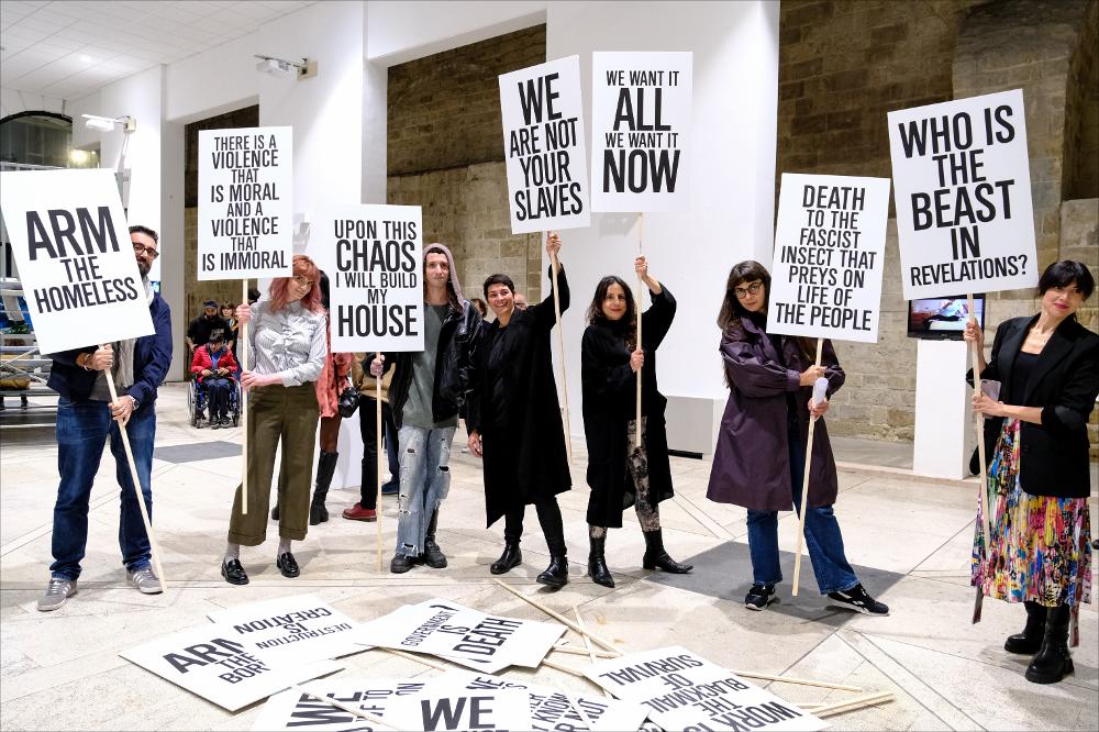 <p class="ql-align-justify">Lo scatto è tratto dall’evento “Enjoy the collapse solo show” - Focus Arte Contemporanea a cura di Pamela Diamante, in coproduzione con Spazio Murat, organizzato nella giornata del 5 novembre 2024 in occasione del BIG - Bari International Gender Festival.</p><p class="ql-align-justify">Si tratta di una mostra personale del collettivo <strong>Democracia</strong>. Il progetto espositivo si articola attraverso diverse forme d’azione, concepite come mezzi espressivi per far performare il corpo sociale in spazi pubblici. </p>...