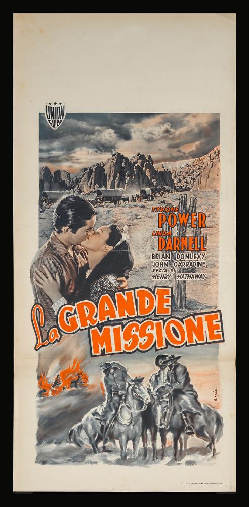 L'immagine riproduce uno dei manifesti conservati presso la Mediateca Regionale Pugliese (vedi Note). Si tratta di una delle versioni grafiche per la locandina del film “La grande missione” del 1940 per la regia di Henry Hathaway. La firma che leggiamo sulla destra, in basso appartiene a E. Pic,, artista dall'identità sconosciuta ma autore di molti manifesti e locandine degli anni Quaranta e Cinquanta del Novecento. La struttura della composizione grafica si presenta suddivisa in più livelli narrativi, riconoscibili in tre aree superiore, centrale ed inferiore. Sono presenti sia scene legate all'ambientazione del film, quindi agli esterni, nella parte superiore ed inferiore, mentre centrale abbiamo un inteso bacio fra i due protagonisti Tyrone Power e Linda Darnell del ...