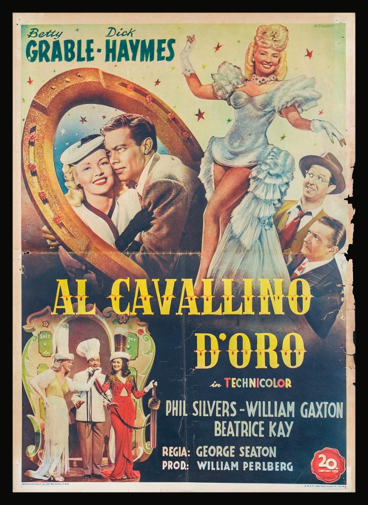 “Il cavallino d’oro” (titolo originale “Diamond Horseshoe”) è un film di genere commedia del 1945, diretto da George Seaton, con Betty Grable e Dick Haymes.
Il manifesto cinematografico è a firma di M. Fuganti, artista di cui non si hanno notizie.
La composizione è estremamente dinamica, divertente, i colori vivaci rendono l’atmosfera briosa. In basso a sinistra è stata inserita una fotografia di scena, mentre le altre parti della composizione sono dipinte con grande cura ritrattistica per i volti dei personaggi protagonisti.
Il manifesto originale è conservato nell’Archivio della Mediateca Regionale Pugliese....