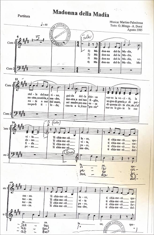 <div class="ql-editor"><div>Canto devozionale dedicato alla Madonna della Madia, eseguito durante le celebrazioni patronali di Monopoli. Datato Agosto 1985, musica di Martino Palmitessa e i testi di O. Menga e A. Dorsi. </div><div><br></div><div>La festa patronale in onore della Madonna della Madia, patrona di Monopoli, nasce dalla tradizione del <strong>1117</strong>, quando secondo la devozione la Vergine giunse nel porto della città su una zattera di travi destinate alla costruzione della cattedrale.</div><div>Il momento più suggestivo è la <strong>rievocazione dell’approdo della Madonna</strong>, che si svolge all’alba del <strong>16 dicembre</strong> e viene riproposta anche il <strong>14 agosto</strong>, accolta da autorità, confrat...