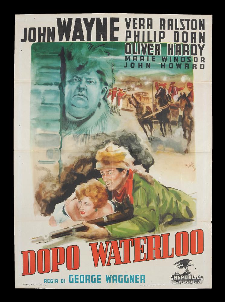 L'immagine riproduce uno dei manifesti conservati presso la Mediateca Regionale Pugliese (vedi Note). Si tratta del manifesto del film "Dopo Waterloo", a firma di Rinaldo Gèleng. Artista poliedrico ed eclettico, dopo gli studi d'arte, visse e lavorò per molti anni a Parigi, poi a Milano dove realizzò una serie di copertine per Mondadori e infine a Roma, dove realizzò alcuni manifesti per i film di Fellini. Il suo stile fresco e pittorico è fatto di pennellate liquide e sfumate, con spunti grafici originali, composizioni personali, in cui rivela la sua dote di ritrattista. "Dopo Waterloo" possiede queste caratteristiche di stile, in una composizione quasi onirica in cui il ritratto, bellissimo, di Oliver Hardy (Onlio) cattura decisamente più di tutto lo sguardo del fruit...