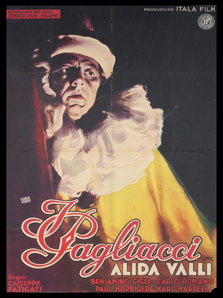 L'immagine riproduce uno dei manifesti conservati presso la Mediateca Regionale Pugliese (vedi Note). Si tratta di una delle versioni grafiche del manifesto del film "I Pagliacci", film italiano del 1943 con Alida Valli. Il manifesto, bellissimo, basa tutta la composizione sull'intensità del personaggio, sulla cui vicenda si snoda tutto il film. Il pregevole lavoro di chiaroscuri, le pennellata vibranti, i pochi colori scelti ne fanno davvero un'opera di cinema notevole, seppur non si conosca l'autore. Il primo piano sull'artista e il fondo quasi totalmente nero immergono il fruitore nell'atmosfera di un "dietro le quinte" teatrale, percependo la tragicità che pervade tutto il film....