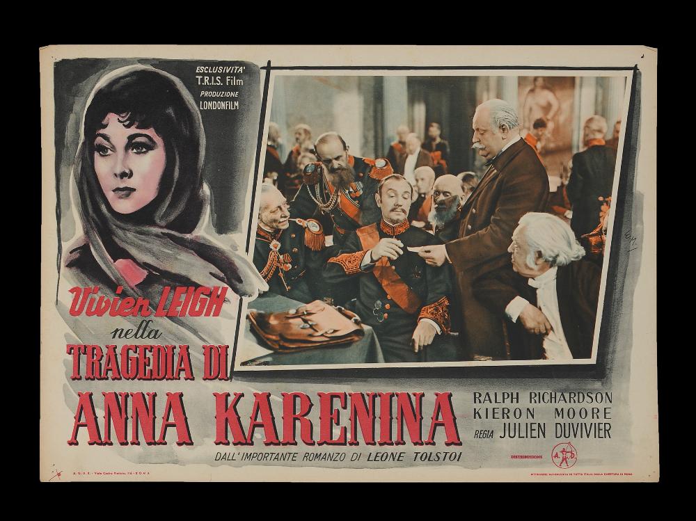 L'immagine riproduce uno dei manifesti conservati presso la Mediateca Regionale Pugliese (vedi Note). Si tratta del soggetto della fotobusta del film "Anna Karenina", a firma dell'illustratore E. M., di cui si può vedere in collezione anche il manifesto a firma di Ercole Brini. Il volto di Anna Karenina è realizzato con poche pennellate vivide, quelle scure accentuano l'intensità e la drammaticità del suo personaggio tormentato e passionale, interpreto dall'attrice Vivien Leigh. L'illustrazione pittorica accompagna e completa, come di consueto, le fotografie di scena....
