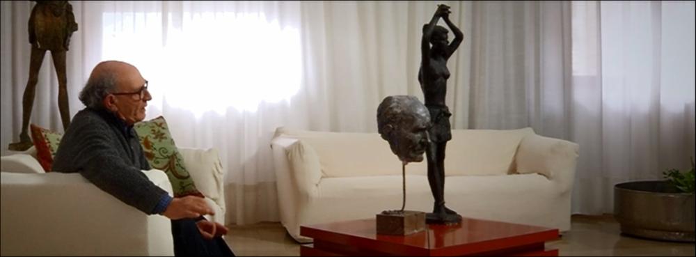Il video in oggetto è un'opera prima realizzata nell’ambito del progetto culturale “Artistory”, ideato nel 2014 dal Prof. Roberto Sibilano con l’intento di dar voce agli artisti che hanno animato il panorama culturale pugliese in età contemporanea. In questo lavoro lo scultore e pittore Antonio Bibbò si racconta in prima persona, come artista e come uomo, richiamando alla memoria i momenti e gli incontri che hanno contribuito alla sua formazione. Nato a Castelvetere (Bn), sin da bambino fu affascinato dalla bellezza delle statue votive conservate nelle chiese del suo paese, tanto da avere l’esigenza di toccarle per un contatto con la loro materia. Con grande affetto e gratitudine ricorda il suo primo maestro, Luigi Parisio, ceramista, pittore e scultore della scuola nap...