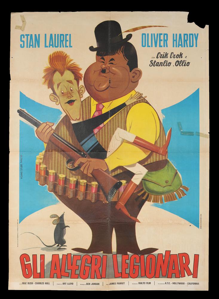 L'immagine riproduce uno dei manifesti conservati presso la Mediateca Regionale Pugliese (vedi Note). Si tratta della locandina del film "Gli allegri legionari", edizione del 1970, a firma di Piovano per lo Studio Paradiso, con il quale realizzerà molti manifesti per il cinema. È una delle moltissime composizioni grafiche realizzate per la comicità di Stanlio & Ollio, il duo iconico tra i più amati della storia del cinema. Anche Piovano mette in risalto lo stile unico e caratterizzante dei due protagonisti, fondato su una comicità elementare che sfrutta la mimica facciale e il linguaggio del corpo per gag semplici, adatte a ogni tipo di pubblico. La composizione fresca e colorata accentua le caratteristiche fisiche e mimiche dei due attori, risaltando ancora una volta i...
