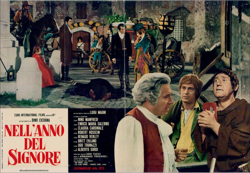 L'immagine digitale è la riproduzione fotografica del manifesto cinematografico del film “Nell'anno del Signore” elaborata in occasione della mostra "Cinema 150 anni. Mostra di manifesti cinematografici d'epoca sul Risorgimento". La mostra, allestita negli spazi della Mediateca Regionale di Bari, è stata realizzata nel 2011 dall'Ufficio Attività culturali e audiovisivi, afferente al Servizio Cultura e Spettacolo della Regione Puglia, in occasione delle celebrazioni dei 150 anni dell'Unità d'Italia. Il cartellonista, giocando sapientemente con i colori, ripropone in primo piano sulla destra alcuni personaggi del film, si riconoscono il prete (Alberto Sordi), il ciabattino (Nino Manfredi) e il Colonnello Nardoni (Enrico Maria Salerno) mentre sullo sfondo, rielaborando abi...